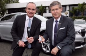 BMW Group New Zealand managing director Florian Renndorfer, left, and Internal Affairs Department VIP Transport manager Steve Dyhrberg announce a free trial of the BMW 740Le xDrive in the Crown VIP Transport fleet.