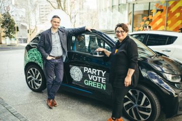 Green Party co-leaders James Shaw and Metiria Turei with the electric BMW i3.