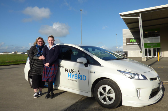 Ali and Nelly Skelton with a driver training centre Prius.