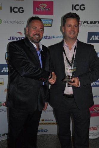 Supercity Towing general manager Craig Burrows presents Ford NZ managing director Simon Rutherford with the ute Best in Class award for the Ford Ranger.