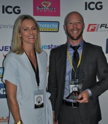 ANZ’s Donna Gaskin presents Hyundai NZ national sales manager Chris Blair with the EV/plug-in hybrid Best in Class award for the Hyundai Ioniq.