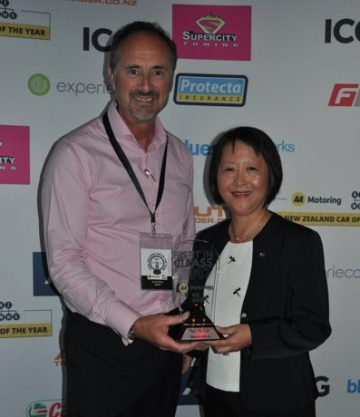 Castrol national sales manager Russell Miller presents Mazda NZ marketing services manager Maria Tsao with the sports car Best in Class award for the Mazda MX-5.
