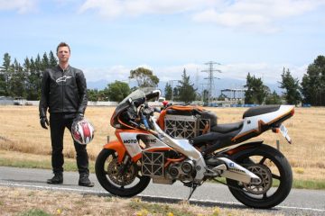 Sytse Tacoma with the electric motorcycle during the 2016 Leading the Charge EV tour.