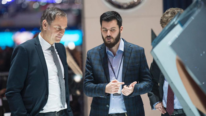 Porsche AG chief executive officer Oliver Blume left and Mate Rimac.