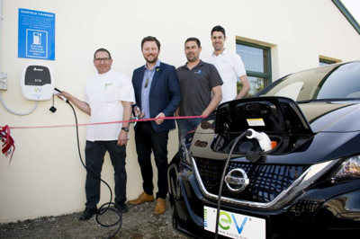 Opening the Darfield charger are, from left, Darfield pharmacist Aaron Orangi, Sam Broughton, Simon Wheeler and David Boot. Photo: William Stewart