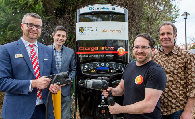Officially opening the charger are, from left, Stephen Willis, Gareth Hughes, ChargeNet NZ chief executive officer Steve West and Otago Chamber of Commerce energy committee chairperson Scott Willis. Photo: Sharron Bennett