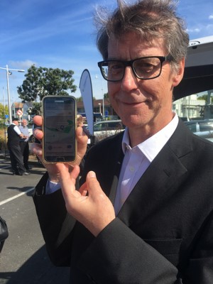AT Metro customer experience manager Peter Paton demonstrates the app.