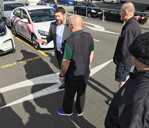 Contact Energy’s Tony Wood with Capital & Coast DHB staff at the EV handover.