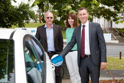 From left, WEL Networks chief executive Garth Dibley, Kiri Hannifin and Labour MP Jamie Strange officially open the Countdown charging stations.