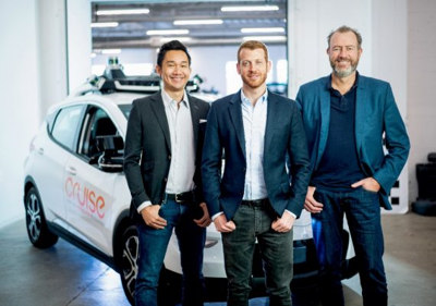 GM president Dan Ammann, right, with Cruise chief operating officer Dan Kan, left, and Kyle Vogt.