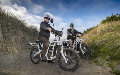 Christchurch park rangers on their electric motorcycles.