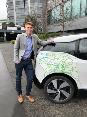 Genesis Executive General Manager Retail Markets James Magill w Yoogo Share car (1)