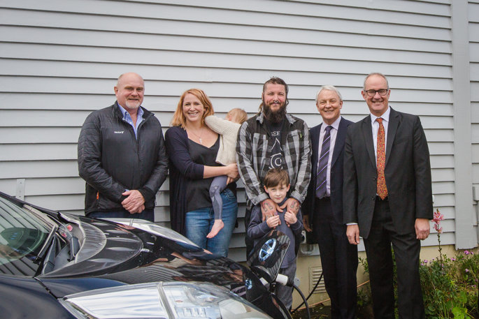Simon Mackenzie, left, triallists Loren and Kim Woolmore and children, Phil Goff and Phil Twyford.