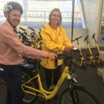 Andrew Roy gets set to test ride a Mercury e-bike with Francesca Cole’s help.