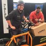 Christian Hoff-Nielsen from Bikes & Barbers and Livall’s Sanchit Mittal with an e-cargo bike.