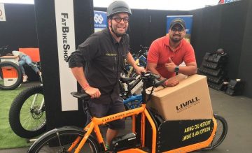 Christian Hoff-Nielsen from Bikes & Barbers and Livall’s Sanchit Mittal with an e-cargo bike.