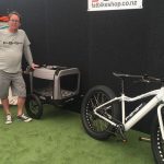 An e-bike pet carrier is shown by FatBikeShop representative Luke Ogier.
