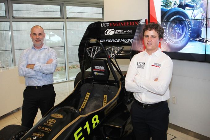 UCM electric race car Bruce Robertson, left, team project leader Jacob Ewing
