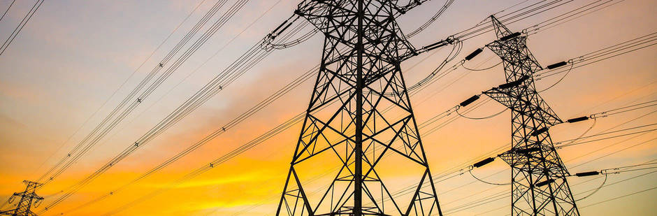 Electric power lines at sunset