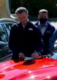 California governor Gavin Newsom signs order on Mustage Mach-E