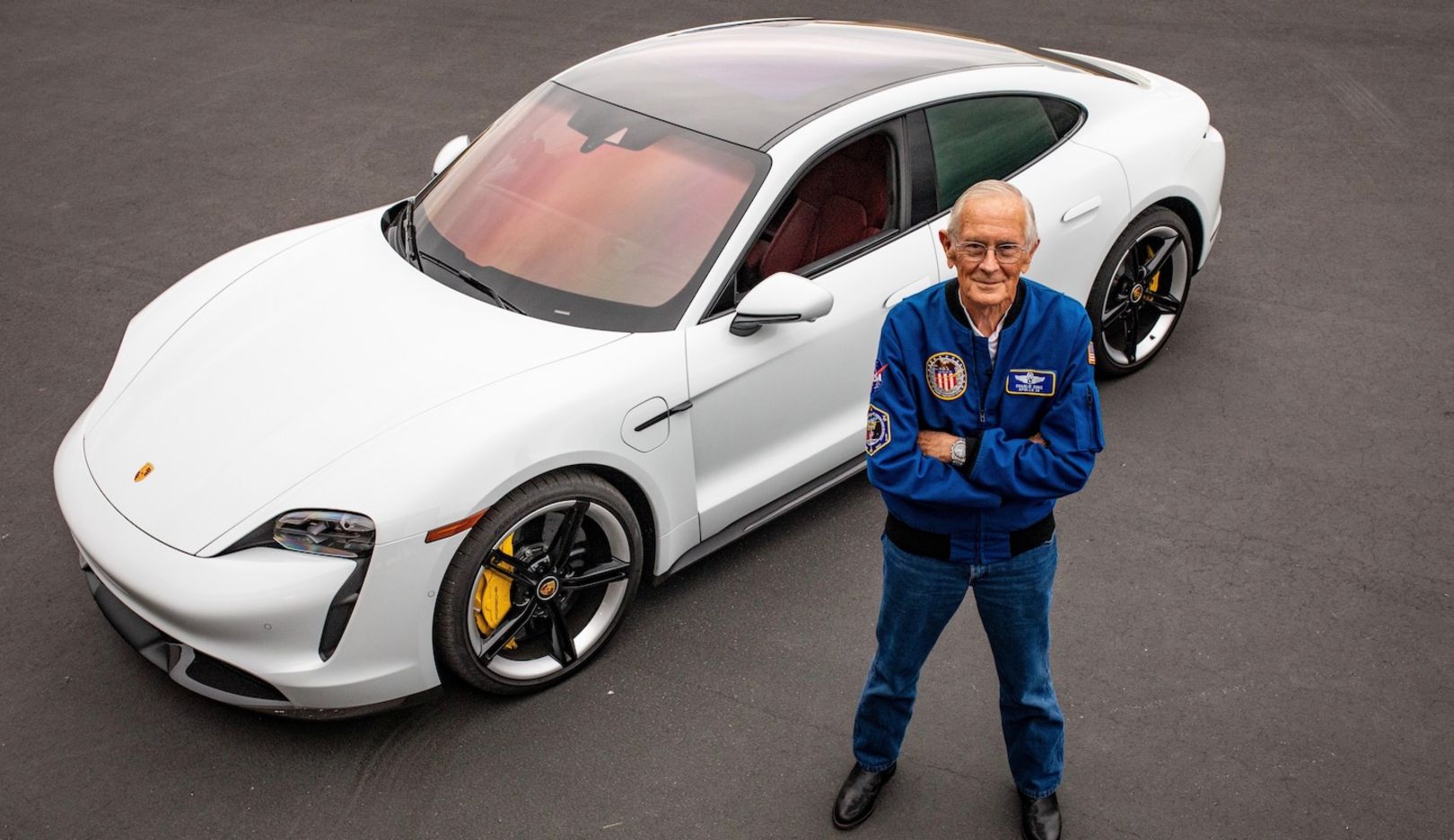 General-Charlie-Duke-and-Porsche-Taycan