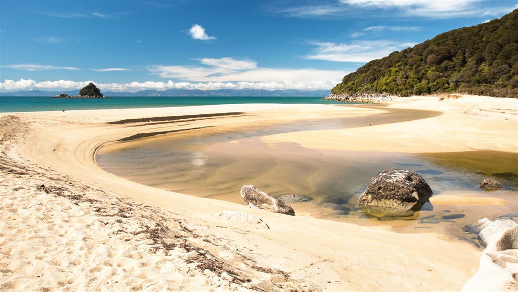 abel-tasman-water-sand-hero