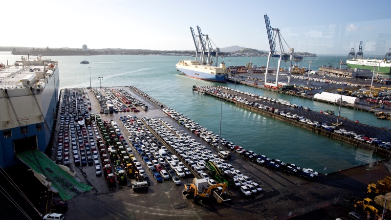 Three roll-on/roll-off vessels discharging vehicles