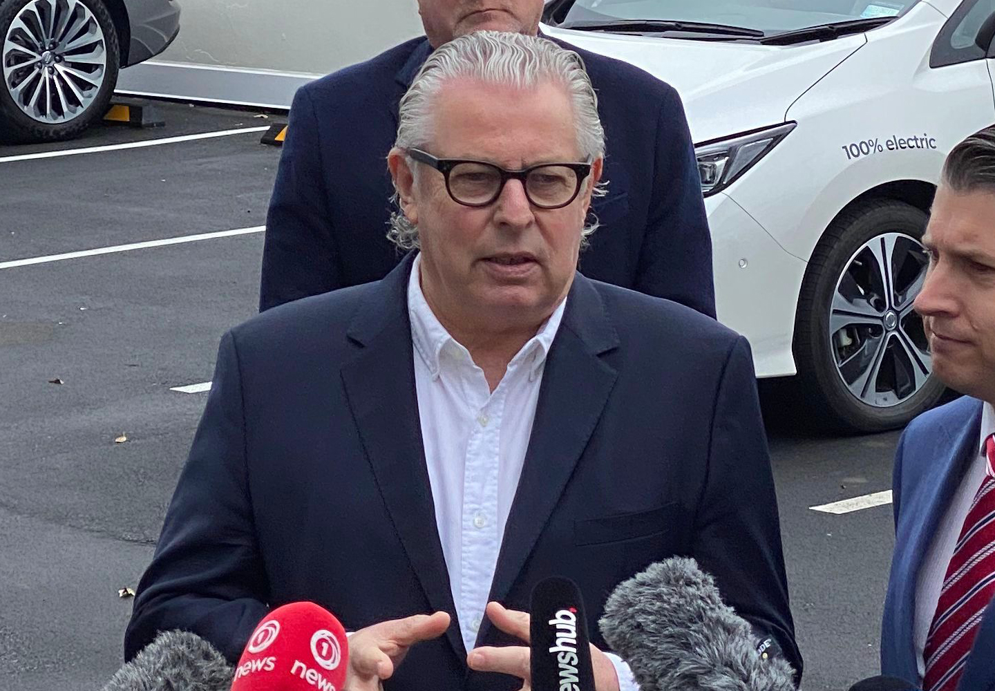 Mark-Gilbert-Drive-Electric-at-Clean-Car-Discount-announcement-with-transport-minister-Michael-Wood