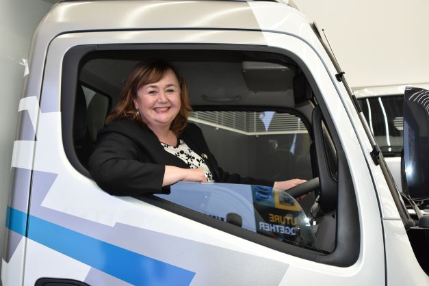 Megan-Woods-prepares-to-drive-FUSO-eCanter-Kawasaki-small