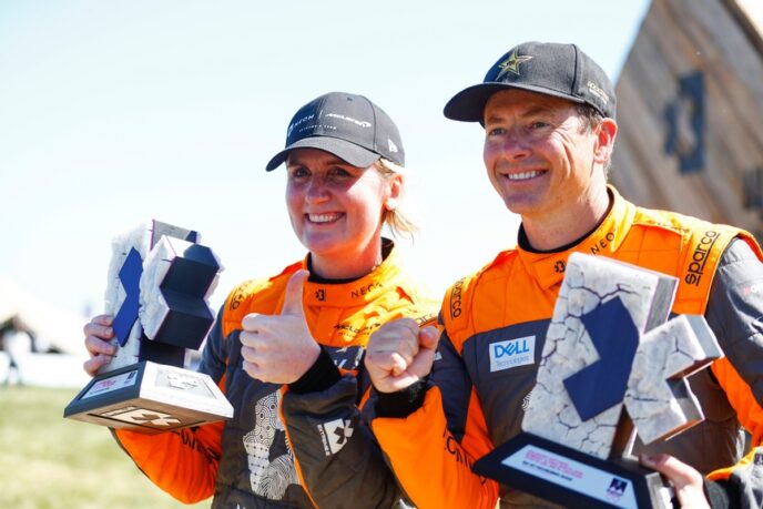 NOVEMBER 27: Emma Gilmour (NZL), NEOM McLaren Extreme E, and Tanner Foust (USA), NEOM McLaren Extreme E, celebrate 2nd Position during the Punta del Este on November 27, 2022. (Photo by Sam Bloxham / LAT Images)
