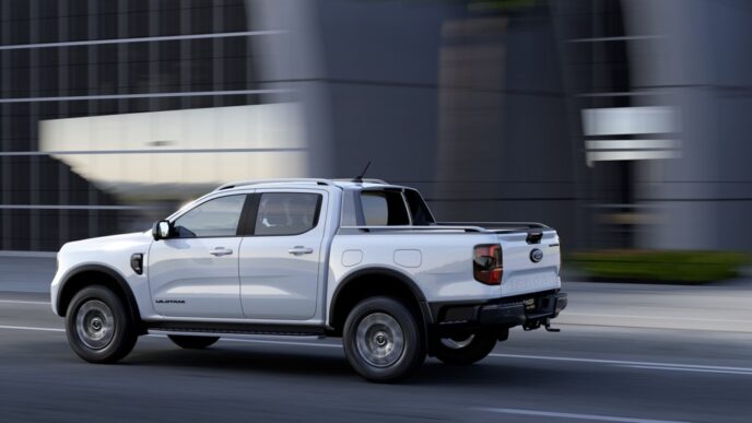 P703_23-PHEV-City-Driving-Rear-RHDweb4