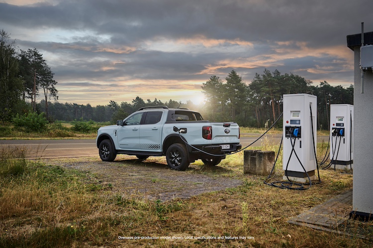 SHOT_03_P703_PHEV_Ext_Rear_7_8_ChargingMED