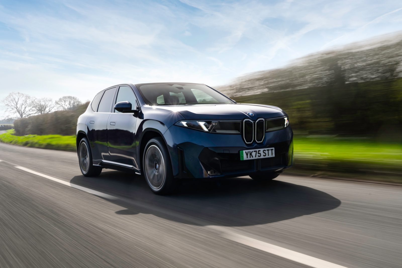 BMW iX3 50 xDrive driving front three-quarter