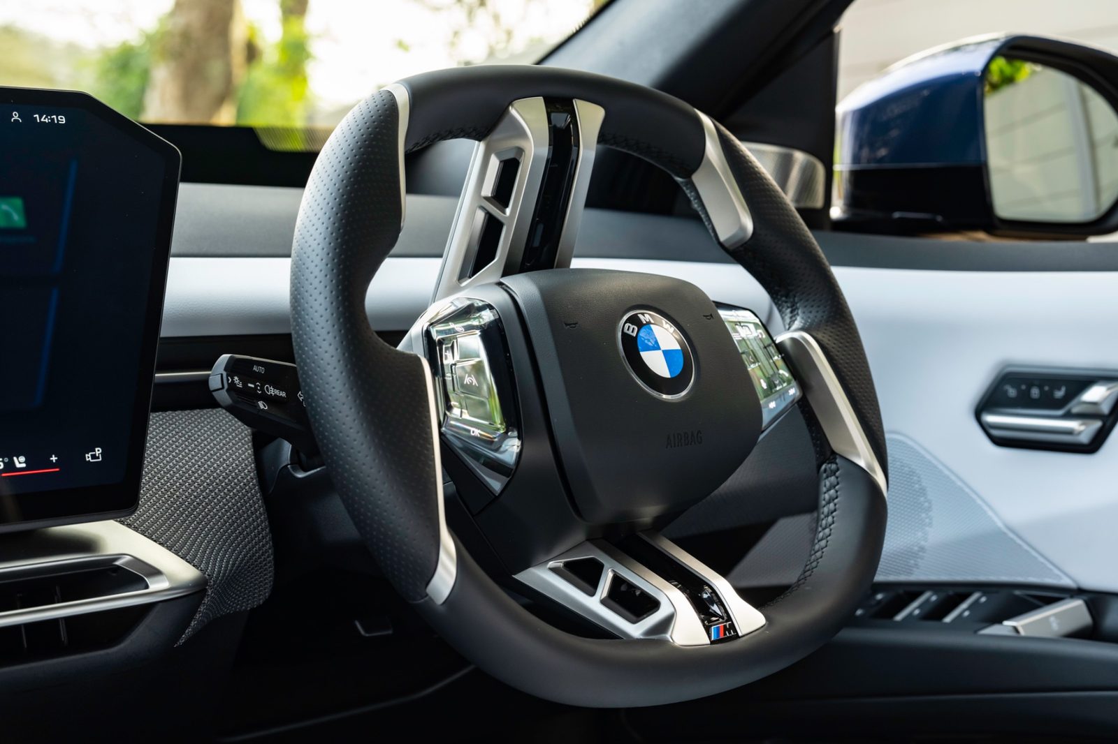 BMW iX3 steering wheel with flat top and bottom