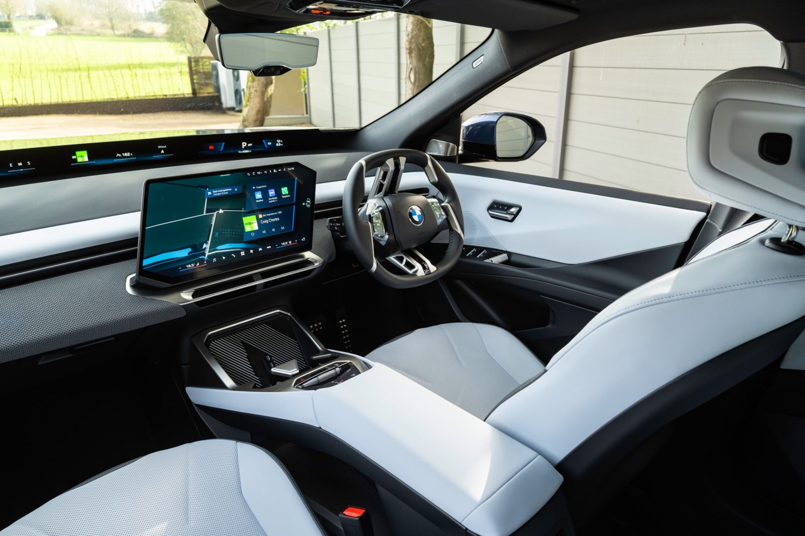 BMW iX3 interior showing the full width of the front cabin