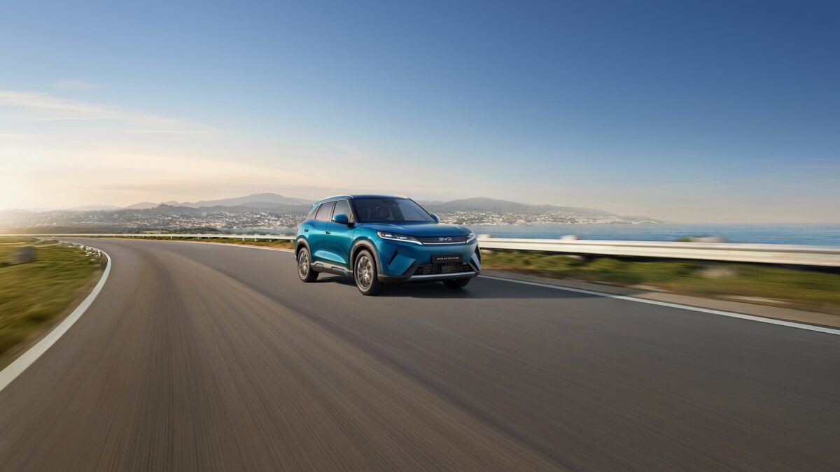 BYD Atto 2 DM-i plug-in hybrid driving on a coastal road