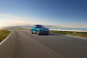 BYD Atto 2 DM-i plug-in hybrid driving on a coastal road