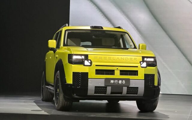 Freelander 8 boxy SUV front three quarter in yellow