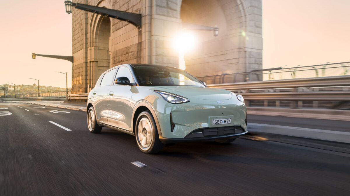 Geely EX2 Inspire driving near the Sydney Harbour Bridge
