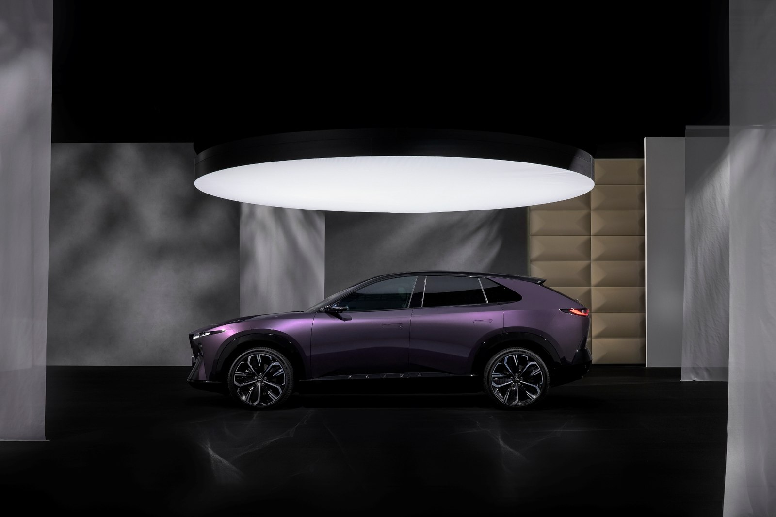 Mazda CX-6e side profile in purple
