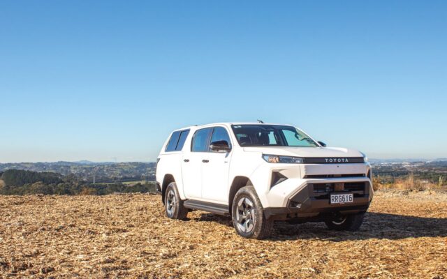 Toyota Hilux BEV parked on farmland
