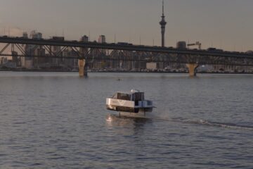 Vessev VS-9 electric hydrofoil foiling on Auckland harbour with the Sky Tower behind