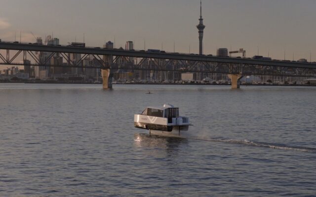 Vessev VS-9 electric hydrofoil foiling on Auckland harbour with the Sky Tower behind