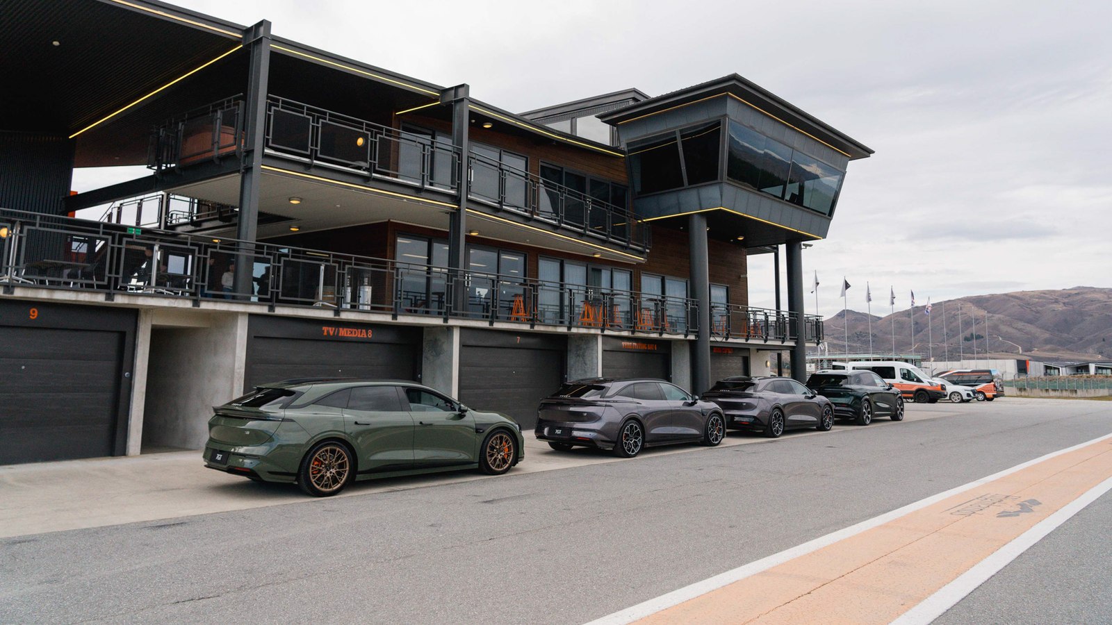 Zeekr 7GT cars lined up in the Highlands Motorsport Park pit lane