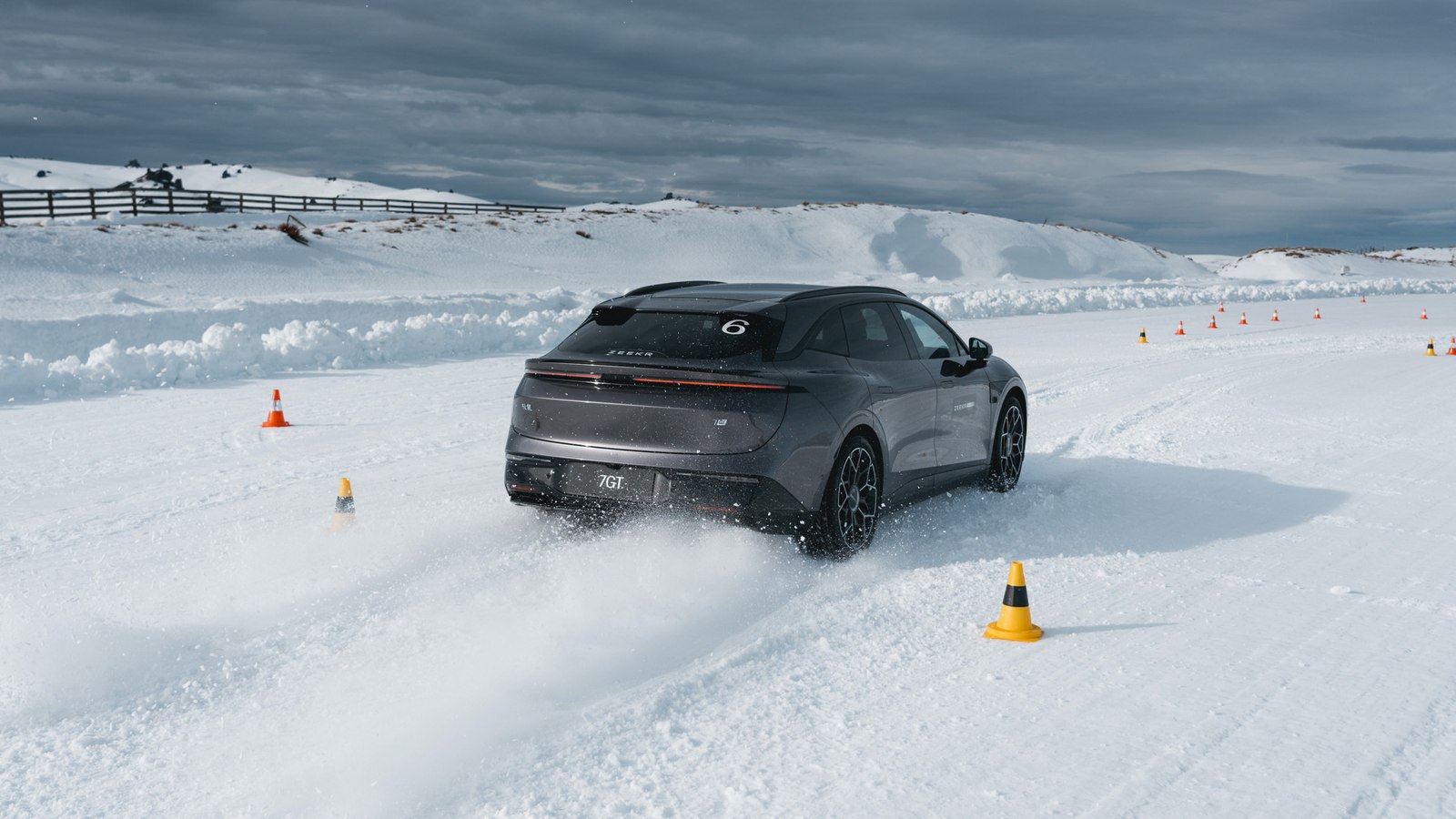 Zeekr 7GT sliding between cones on snow at the Southern Hemisphere Proving Grounds