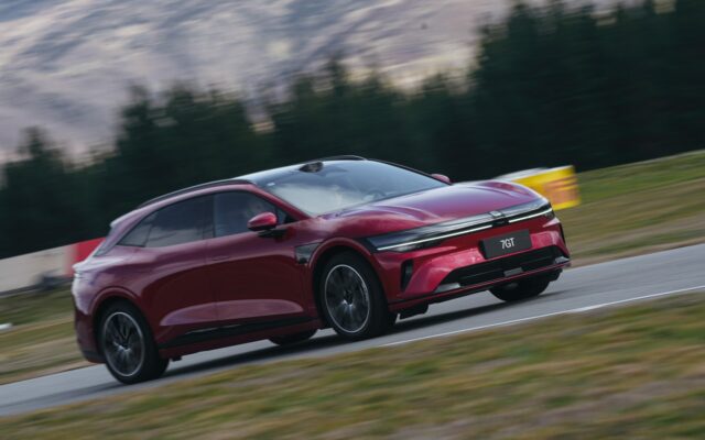Red Zeekr 7GT cornering at speed at Highlands Motorsport Park