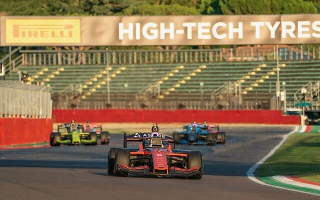 Autonomous race cars at speed at Imola in the A2RL race