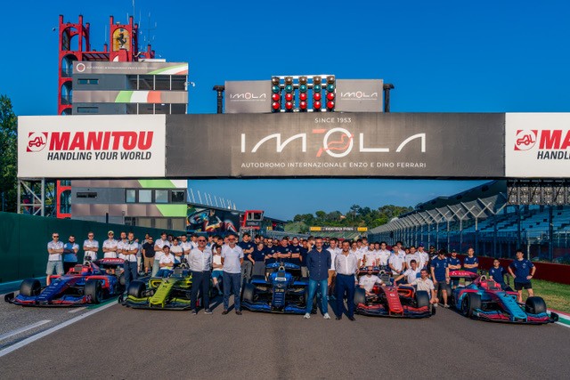 A2RL teams and cars lined up on the Imola start line