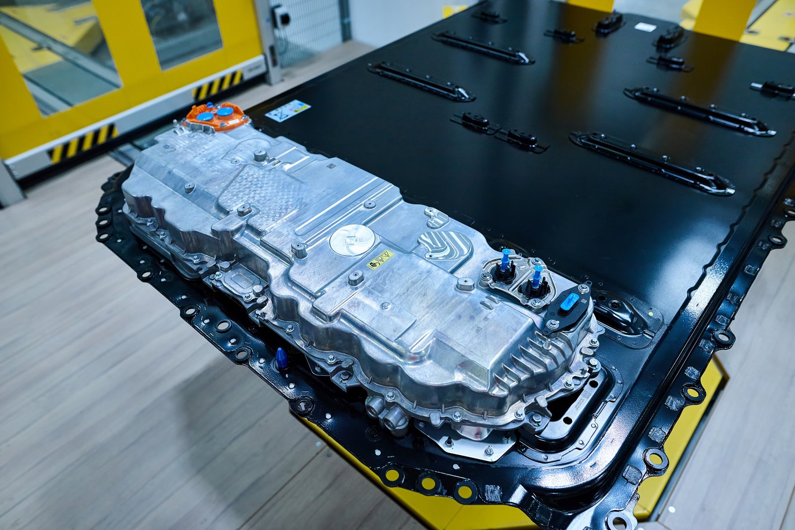Close-up of the Energy Master unit mounted on a BMW Gen6 high-voltage battery