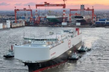 BYD Changzhou car carrier leaving a Chinese shipyard with tugs